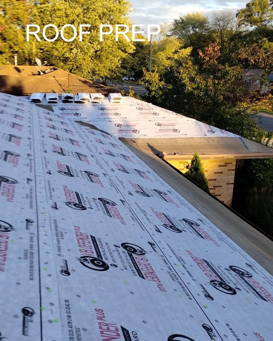 Roof during preparation with new synthetic underlayment installed